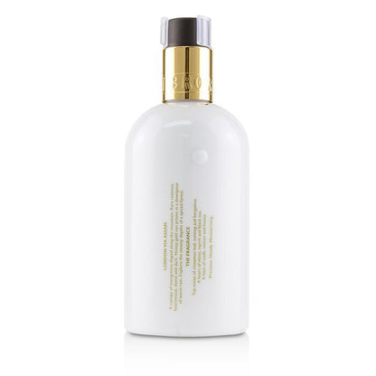Molton Brown Lait pour le corps envoûtant Accord Oudh & Or 300ml/10oz