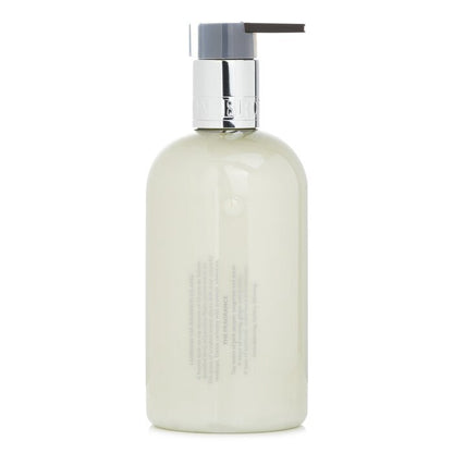Molton Brown Lotion pour les mains Poivre rose ardent 300ml/10oz